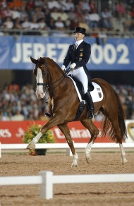 Nadine Capellmann (GER) and Farbenfroh take the World Championship - ©Kit Houghton / FEI